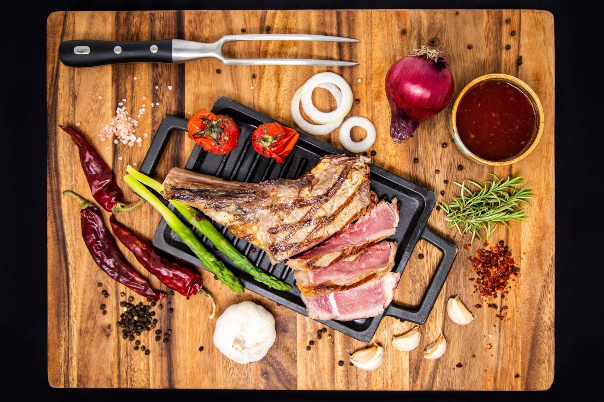 Sheraton Batumi Hotel Bagian luar foto A steak on a cutting board