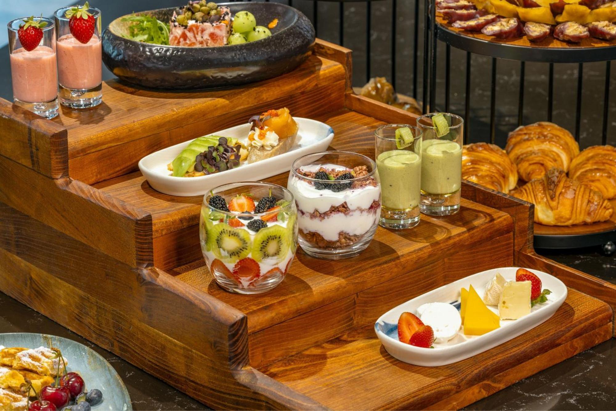 Sheraton Batumi Hotel Bagian luar foto A selection of desserts