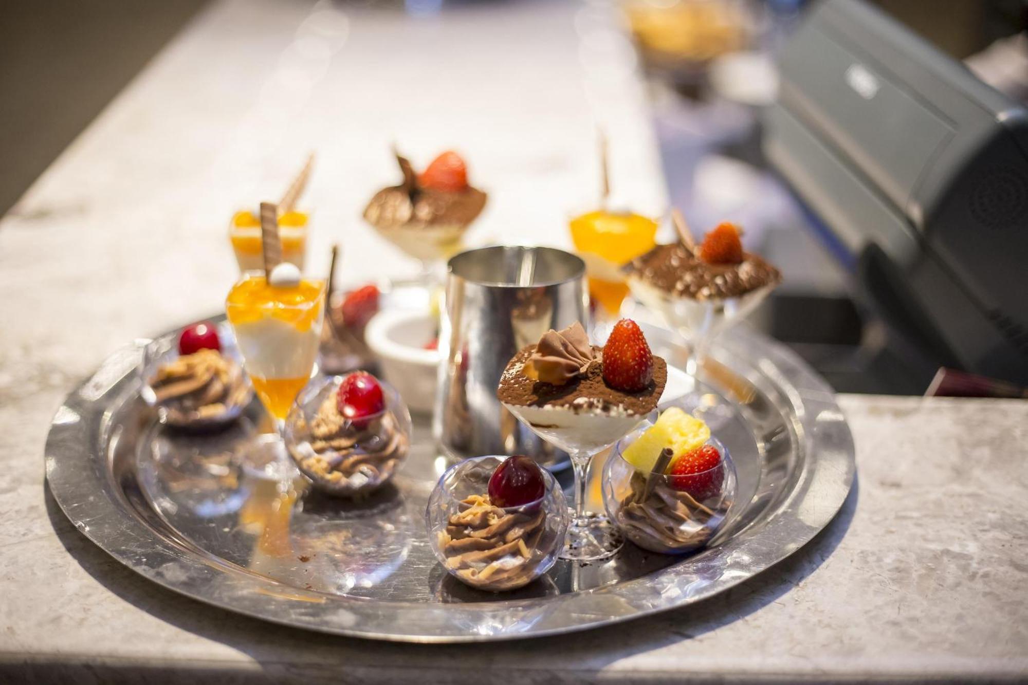 Sheraton Batumi Hotel Bagian luar foto A selection of desserts